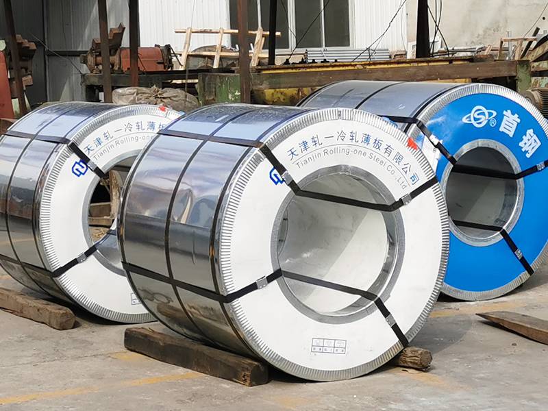 Steel sheet coils for expanded metal production are placed on the ground.