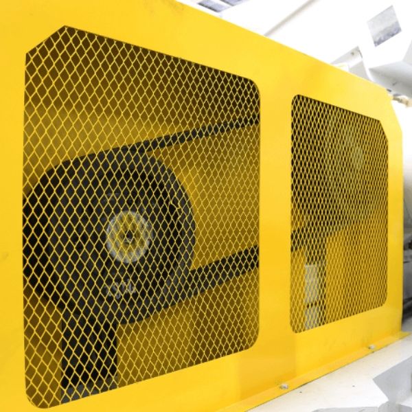 Yellow expanded metal machine guards are used to protect the pulley and belt parts.