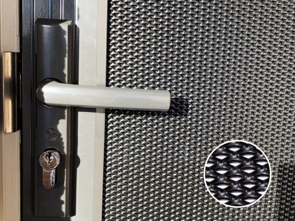 Partial details of heavy duty DVA mesh security door handle